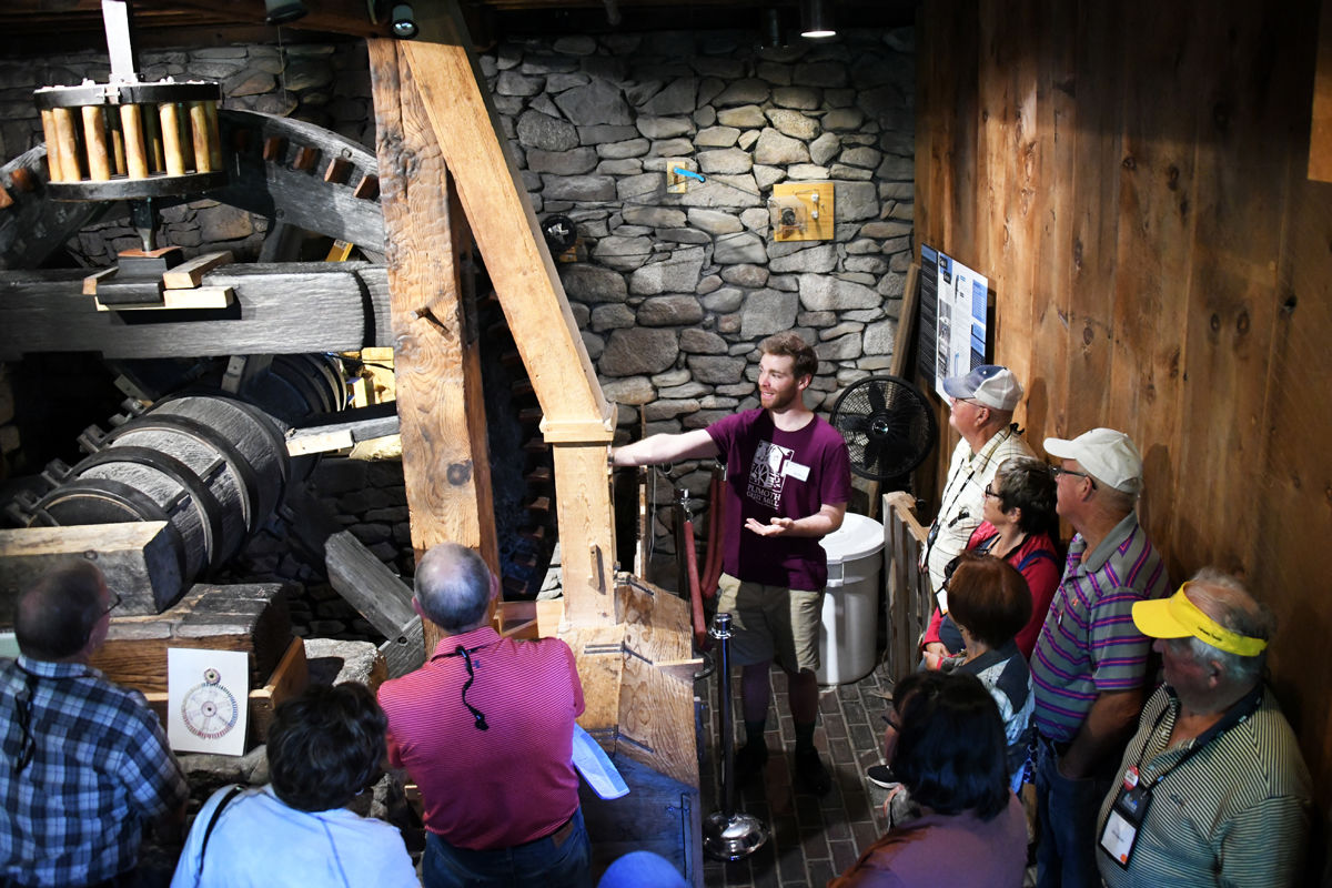 011 The Fun Club receives an explanation of the workings of the gristmill.jpg